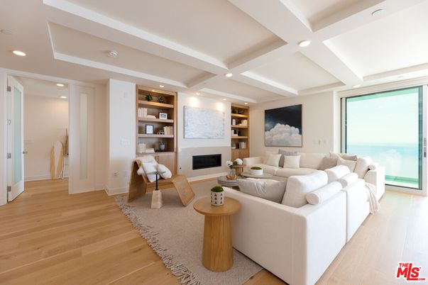 Fireplace, Interior, Living room, Recessed Lighting, Water, Wood Texture Flooring