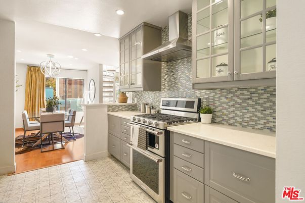 Chandelier, Dining room, Interior, Kitchen, Recessed Lighting, Stainless Steel Appliances, Wood Texture Flooring