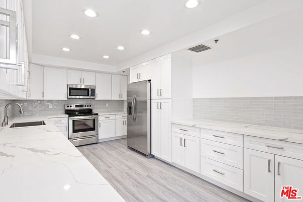 Interior, Kitchen, Recessed Lighting, Stainless Steel Appliances, Wood Texture Flooring