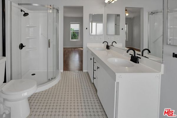 Bathroom, Dual Sink Vanities, Glass Shower, Interior, Wood Texture Flooring