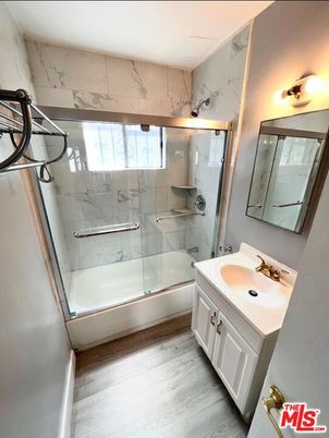 Bathroom, Glass Shower, Interior, Marble Walls, Wood Texture Flooring