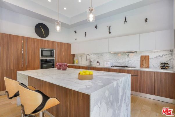 Interior, Kitchen, Marble Walls, Pendant Lights, Recessed Lighting, Stainless Steel Appliances, Wood Texture Flooring