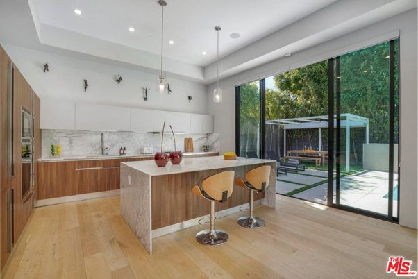 Interior, Kitchen, Marble Walls, Pendant Lights, Recessed Lighting, Wood Texture Flooring