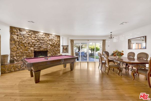 Billiard Table, Dining room, Fireplace, Game Room, Interior, Stone Walls, Wood Texture Flooring
