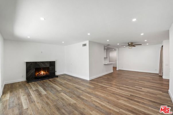 Empty room, Fireplace, Interior, Recessed Lighting, Wood Texture Flooring