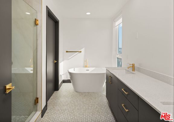 Bathroom, Dual Sink Vanities, Free Standing Baths, Glass Shower, Interior, Recessed Lighting