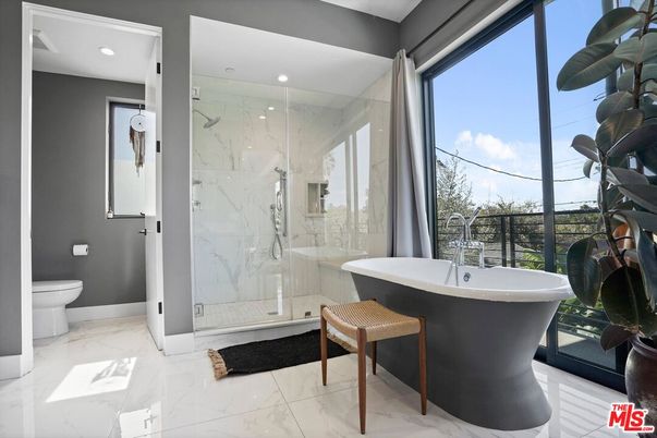 Bathroom, Free Standing Baths, Glass Shower, Interior, Marble, Marble Walls, Recessed Lighting
