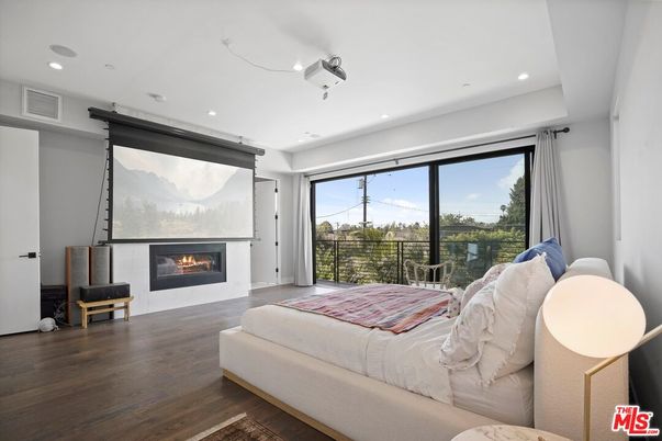 Bedroom, Fireplace, Interior, Recessed Lighting, Wood Texture Flooring