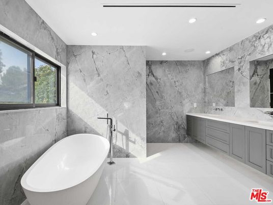 Bathroom, Dual Sink Vanities, Free Standing Baths, Interior, Marble Walls, Recessed Lighting
