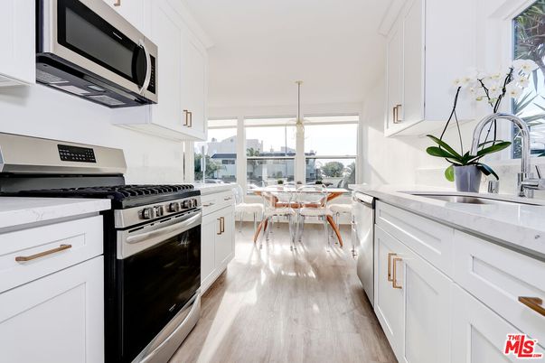 Dining room, Interior, Kitchen, Pendant Lights, Stainless Steel Appliances, Wood Texture Flooring