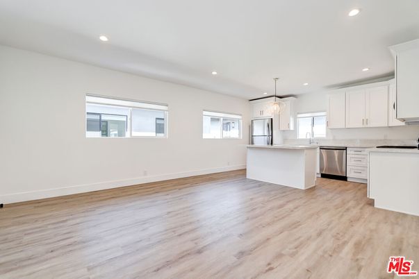 Chandelier, Interior, Kitchen, Pendant Lights, Recessed Lighting, Stainless Steel Appliances, Wood Texture Flooring