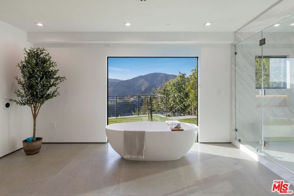 Bathroom, Free Standing Baths, Glass Shower, Interior, Marble Walls, Recessed Lighting