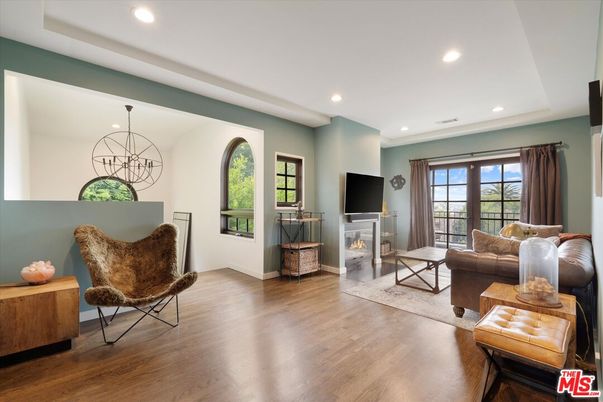 Chandelier, Fireplace, Interior, Living room, Recessed Lighting, Wood Texture Flooring