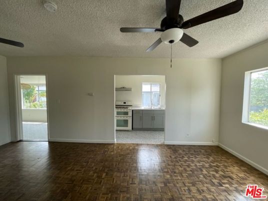 Empty room, Interior, Kitchen, Stainless Steel Appliances, Wood Texture Flooring