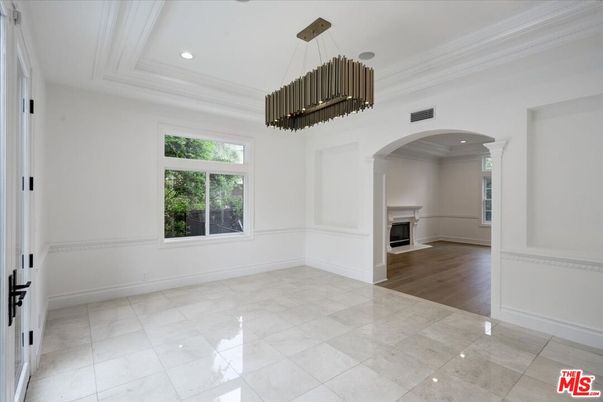 Chandelier, Empty room, Fireplace, Interior, Recessed Lighting, Wood Texture Flooring