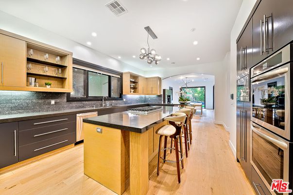 Chandelier, Interior, Kitchen, Pendant Lights, Recessed Lighting, Stainless Steel Appliances, Wood Texture Flooring