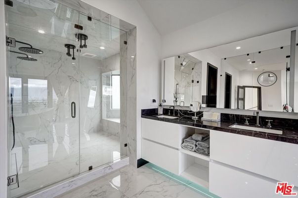 Bathroom, Dual Sink Vanities, Glass Shower, Interior, Marble, Marble Walls, Recessed Lighting
