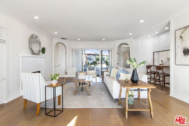 Dining room, Fireplace, Interior, Living room, Recessed Lighting, Wood Texture Flooring