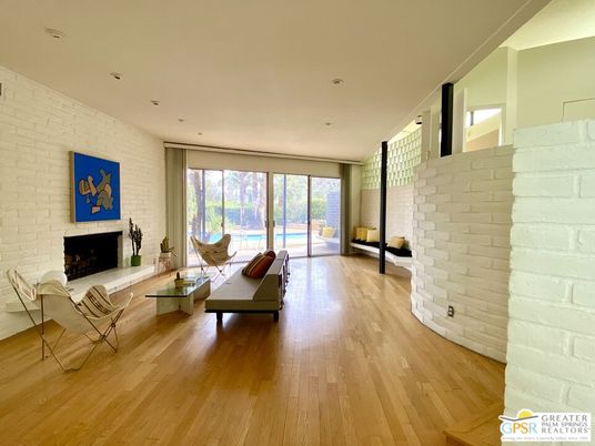 Fireplace, Interior, Living room, Recessed Lighting, Stone Walls, Wood Texture Flooring