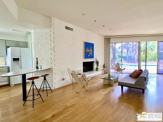 Fireplace, Interior, Living room, Recessed Lighting, Stone Walls, Wood Texture Flooring