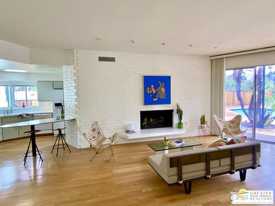 Fireplace, Interior, Living room, Recessed Lighting, Stone Walls, Wood Texture Flooring