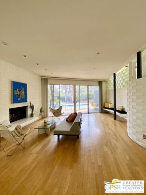 Fireplace, Interior, Living room, Recessed Lighting, Stone Walls, Wood Texture Flooring