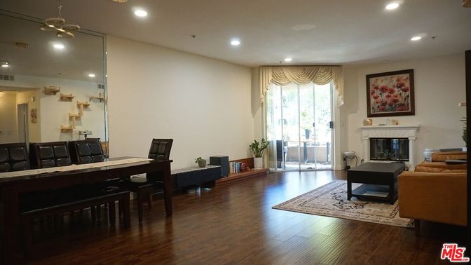 Dining room, Fireplace, Interior, Living room, Pendant Lights, Recessed Lighting, Wood Texture Flooring