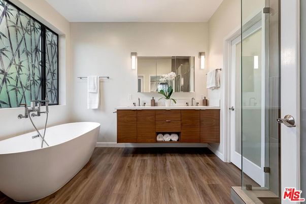 Bathroom, Dual Sink Vanities, Free Standing Baths, Glass Shower, Interior, Wood Texture Flooring
