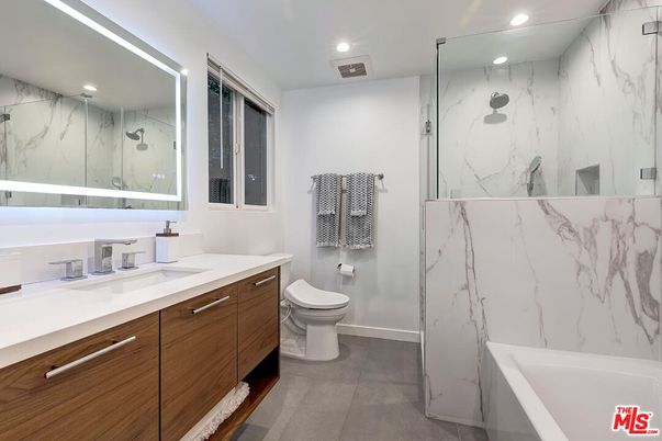 Bathroom, Dual Sink Vanities, Glass Shower, Interior, Marble Walls, Recessed Lighting
