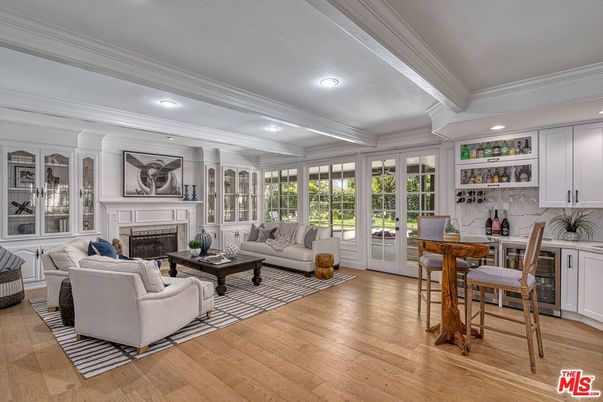 Dining room, Fireplace, Interior, Living room, Recessed Lighting, Wood Texture Flooring