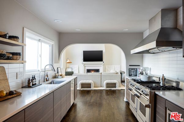 Fireplace, Interior, Kitchen, Living room, Recessed Lighting, Stainless Steel Appliances, Wood Texture Flooring