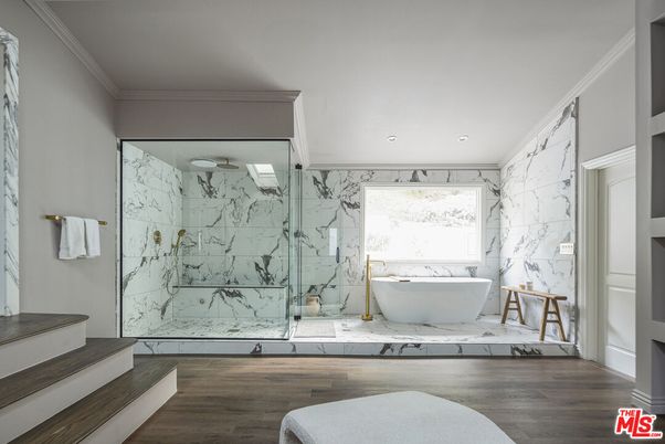 Bathroom, Free Standing Baths, Glass Shower, Interior, Marble, Marble Walls, Recessed Lighting, Wood Texture Flooring