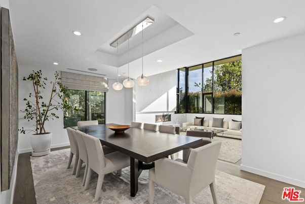 Dining room, Fireplace, Interior, Living room, Pendant Lights, Recessed Lighting, Wood Texture Flooring