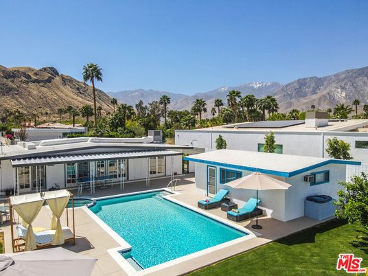 Exterior, Pool, Solar Panels
