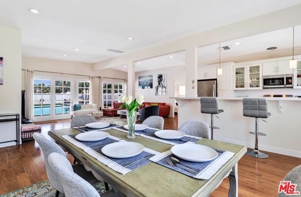 Dining room, Interior, Kitchen, Living room, Pendant Lights, Recessed Lighting, Stainless Steel Appliances, Wood Texture Flooring