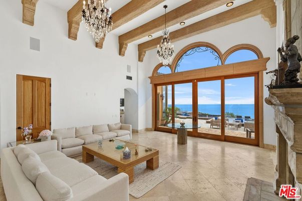 Chandelier, Fireplace, Interior, Living room, Recessed Lighting, Water, Wooden Beams