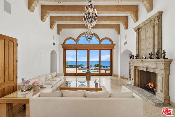 Chandelier, Fireplace, Interior, Living room, Water, Wooden Beams
