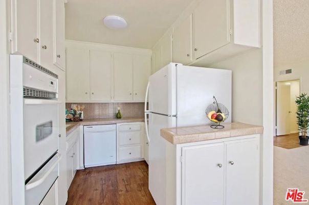 Interior, Kitchen, Tile Countertops, Wood Texture Flooring