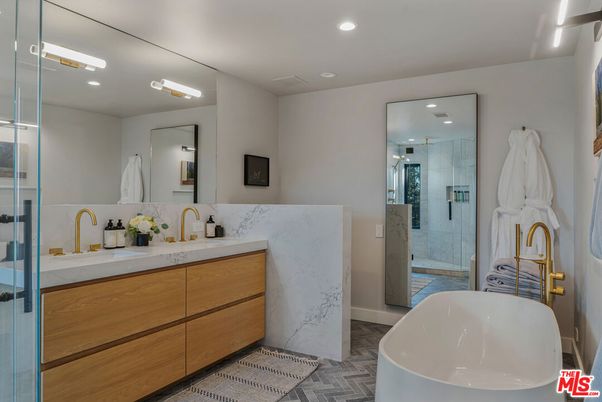 Bathroom, Dual Sink Vanities, Free Standing Baths, Glass Shower, Interior, Marble Walls, Recessed Lighting