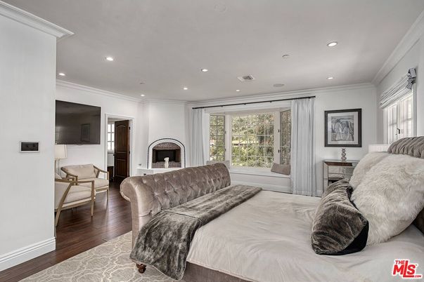 Bedroom, Fireplace, Interior, Recessed Lighting, Wood Texture Flooring