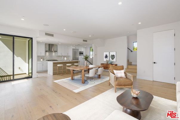 Dining room, Interior, Kitchen, Living room, Recessed Lighting, Stainless Steel Appliances, Wood Texture Flooring