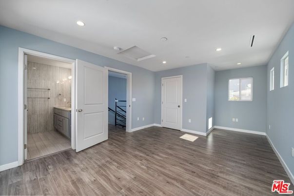 Bathroom, Empty room, Glass Shower, Interior, Recessed Lighting, Wood Texture Flooring