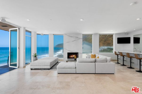 Fireplace, Interior, Living room, Marble Walls, Recessed Lighting, Water