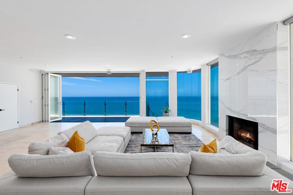 Fireplace, Interior, Living room, Marble Walls, Recessed Lighting, Water