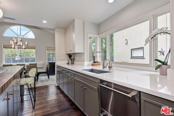 Chandelier, Dining room, Interior, Kitchen, Recessed Lighting, Stainless Steel Appliances, Wood Texture Flooring