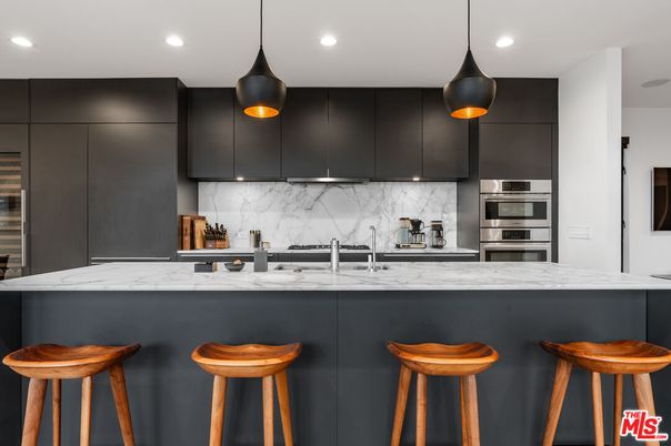 Interior, Kitchen, Marble Walls, Pendant Lights, Recessed Lighting, Stainless Steel Appliances