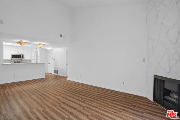 Empty room, Fireplace, Interior, Kitchen, Marble Walls, Wood Texture Flooring