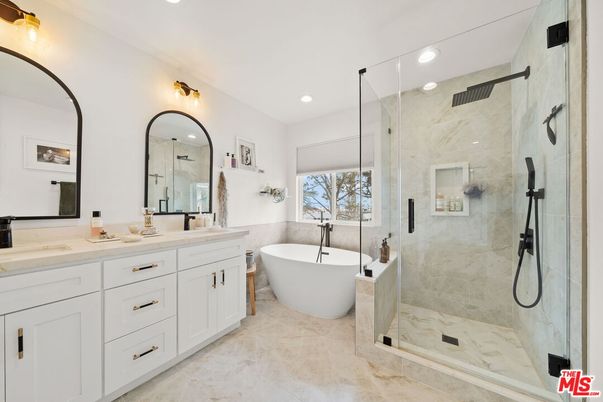 Bathroom, Dual Sink Vanities, Free Standing Baths, Glass Shower, Interior, Marble Walls, Recessed Lighting