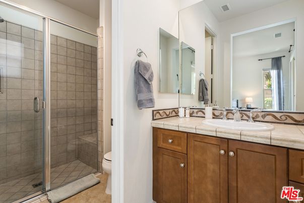 Bathroom, Dual Sink Vanities, Glass Shower, Interior, Tile Countertops