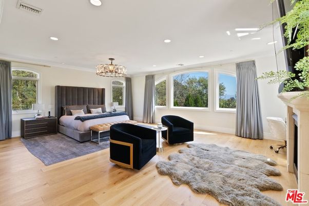 Bedroom, Chandelier, Fireplace, Interior, Recessed Lighting, Wood Texture Flooring